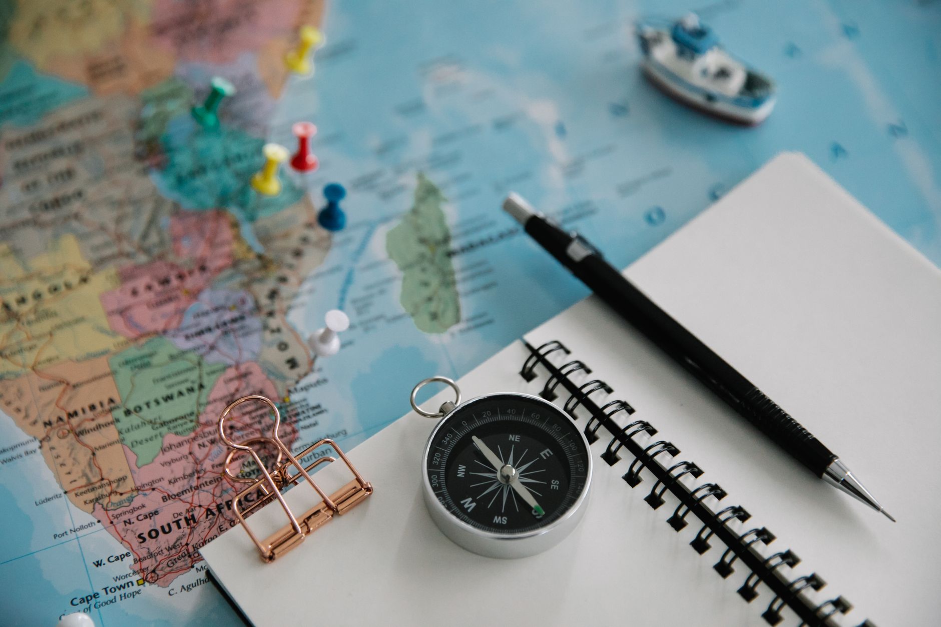 Custom itinerary notebook with compass